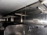 an image of a commercial kitchen with stainless steel appliances