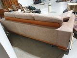 a couch that is sitting in the middle of a room