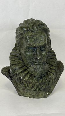 statue of a man with a beard and a bearded face