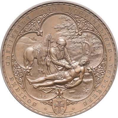 l'image d'une pièce d'argent sur laquelle figure un homme allongé sur un cheval