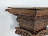a wooden table with a book on top of it
