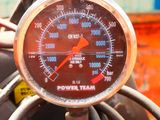 a close up view of a gauge on a motorcycle