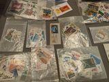 a table with a lot of stamps on it