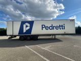 a semi truck that is parked in a parking lot
