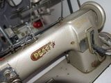 a sewing machine that is sitting on top of a table
