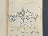 un livre ouvert sur lequel figure un dessin représentant des chevaux