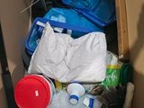 a box full of items that are sitting in the floor