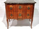 a marble top chest of drawers on a wooden stand