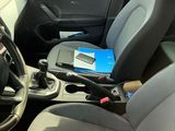 a picture of the inside of a car with the driver seat down