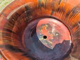 a large bowl with a hole in the middle of it