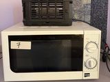 a toaster oven sitting on top of a counter