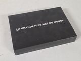 a black box with white writing on it on a table