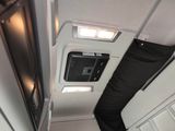 a view of the inside of an airplane with the door open