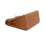 the brown leather purse is open and ready to be carried