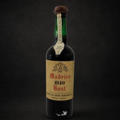 a bottle of wine with a cork on top of it