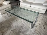 a glass table with a glass top in a living room