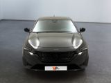 the front view of a grey car parked in a room