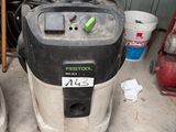 a vacuum that is sitting in the garage