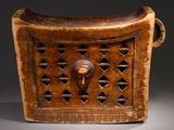 an old wooden box with a lion head on the front of it