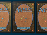 three decks of magic the gathering deck are shown in three different positions