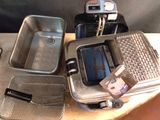 many different types of cooking utensils on a table