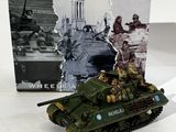the toy tank is sitting next to the box of the box