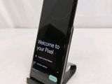 the back of a black phone with a welcome screen on it