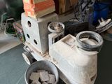 a machine that is sitting on a table in a garage
