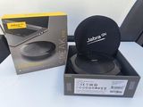 a box with a laptop and a speaker in it