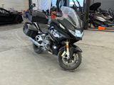 a motorcycle that is parked in a garage