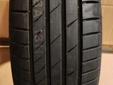 a close up of a tire on a cardboard box