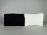 two black and white bags sitting next to each other on a table