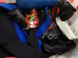 a pile of luggage that is sitting on a bed
