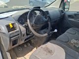 a car that has a steering wheel and a dashboard