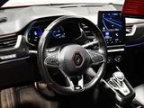 the interior of a car with a steering wheel and dashboard controls