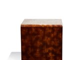 an image of a small wooden box on a white surface