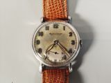 a watch that is sitting on top of a table