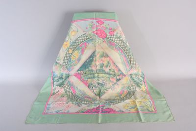 green and pink silk scarf with a picture of a woman in a garden