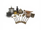 une image représentant un ensemble d'objets, notamment une théière, une théière et d'autres objets