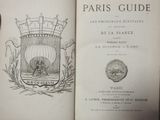 an open book with a picture of a castle on it