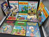 a lot of comic books on display in a display case