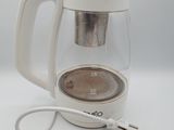 une photo d'une cafetière avec un cordon d'alimentation