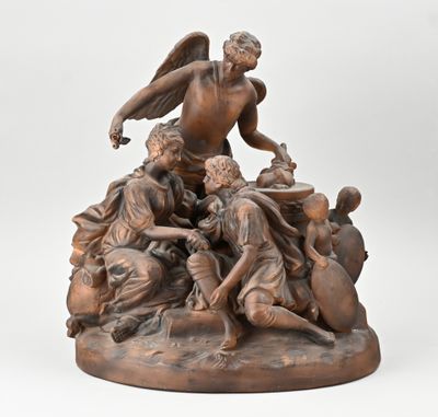 an image of a bronze statue of an angel with a group of people