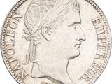 a close up of a coin with a woman ' s head on it