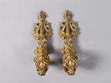 pair of antique gold plated earrings on a white background