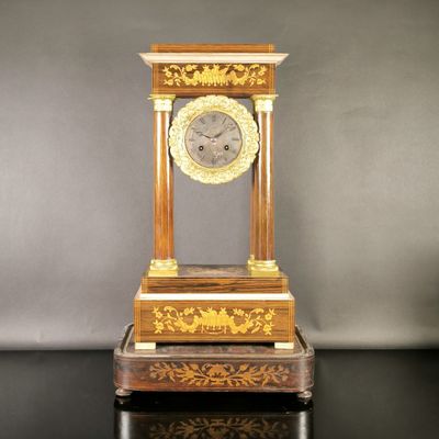 a clock that is sitting on top of a table