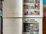 a lot of books that are on the table