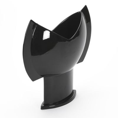 a black vase that is shaped like a bird ' s head