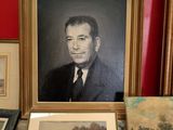a picture of a man in a suit and tie next to a picture of a man in a suit and tie