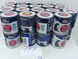 many cans of paint sitting on a white table